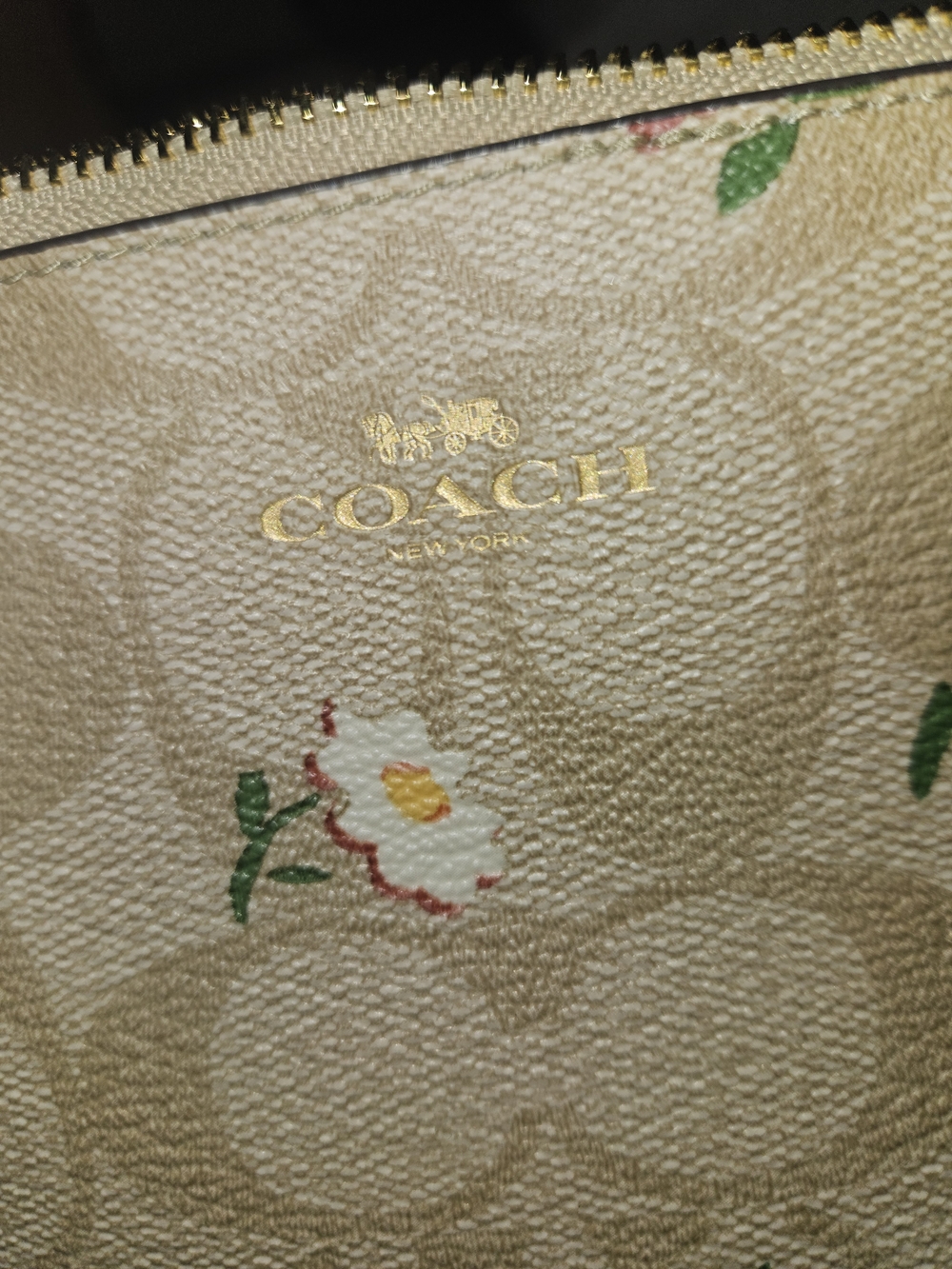 Coach Beige Signature Floral. Corner Zip  Wristlet
